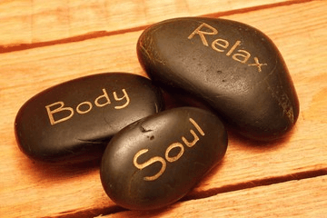 Massage stones engraved with Body, Soul and Relax